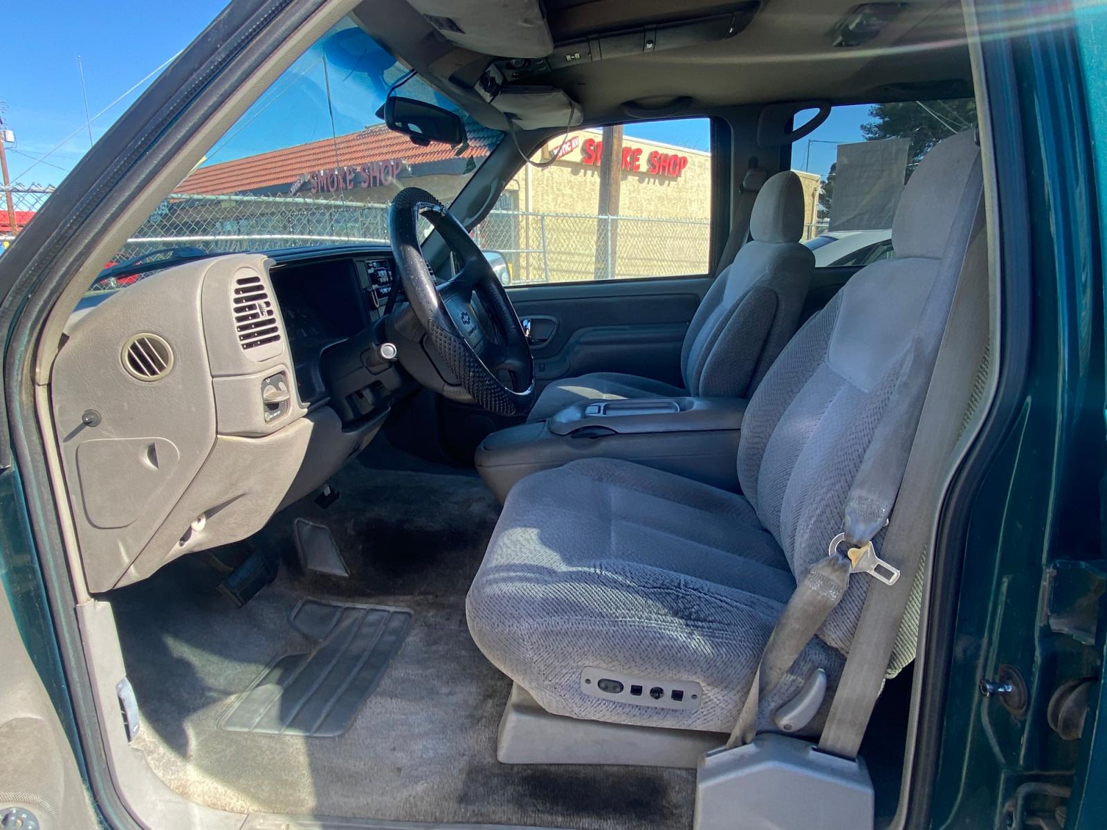 1996 Chevrolet Suburban C1500 2WD (1GNEC16R4TJ) with an 5.7L V8 OHV 16V engine, 4-Speed Automatic Overdrive transmission, located at 44356 Date Ave., Lancaster, CA, 93534, (661) 945-6555, 34.688919, -118.139374 - Photo #3
